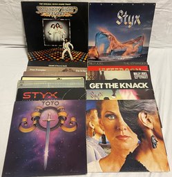 Collection Of Classic Rock Vinyl Records Including Styx, Billy Joel, And Toto