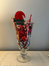 13 3/4 H Footed Glass Vase Full Of Red Holiday Ornaments