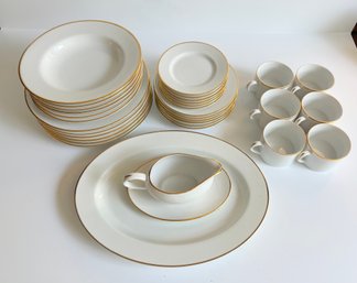Set Of Pier 1 Plates With Gold Trim