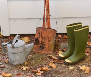 Bamboo Garden Stakes And Watering Garden With Distressed Metal Flower Bucket And Pair Of Wellies