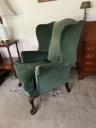 Wingback Green Upholstered Chair Featuring Ball & Claw Feet