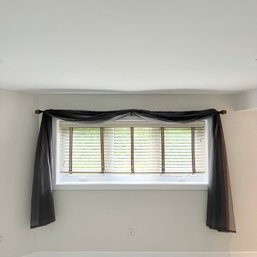 A Sheer Draped Curtain Panel