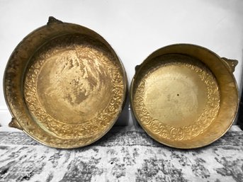 A Pairing Of Lidded Repousse Silver Plated Dessert Trays