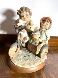 Giuseppe Armani Figurine - Boys On Bicycle With Dog And Side Cart.