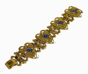 Vintage Gold Tone Heart Shaped Bracelet Having Blue Rhinestones