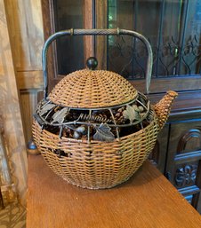 Large Wicker Teapot Basket Filled With Pine Cones