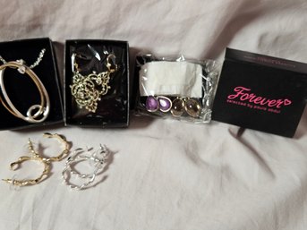 6 Pieces Of Jewelry, One Necklace 5 Pair Earrings, One With Changeable Drop
