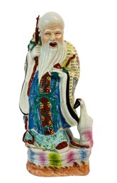 Signed Chinese Porcelain Deity Figure
