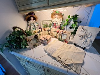 Decor Lot Of, 2 Dolls, Resin Frames, Basket Of Faux Ivy, Linen Hand Towels