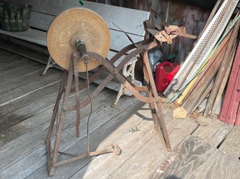 An Antique Stone Sharpening Wheel