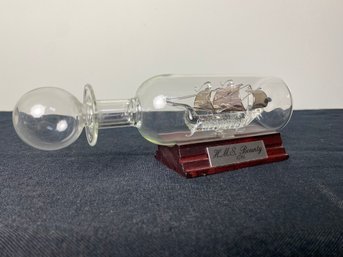 H.M.S Bounty Glass Ship In A Bottle With Display