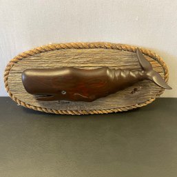 A Wooden  Whale Oval Driftwood  Plaque With Rope Edge