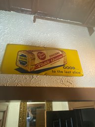 Bread Sign Above Bathrooms