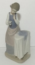 B. Lladro Retired #4981 Girl, Iron & Ironing Board Chalk-ware Figurine