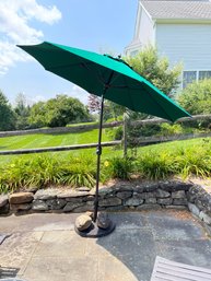 Sunbrella Patio Green Canvas Umbrella With Umbrella Base.  Lot 2