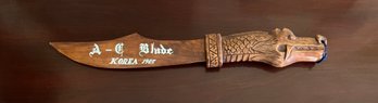 Interestingly Decorated Wooden Sword With A Dragon Head Handle