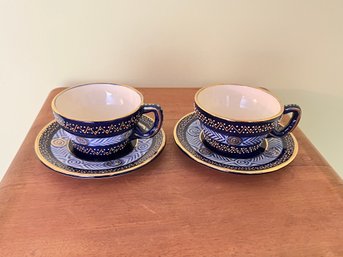 Pair Of Quimper Teacups And Saucers