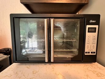 Oster French Door Countertop Oven, In New Condition, 2 Shelves