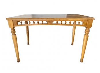 A Planked Table With Turned Bee Hive Design