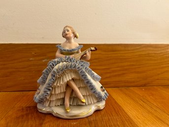 Porcelain Lady Playing Guitar In Blue Dress