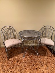 Set Of 2 Chairs And A Round Metal Table