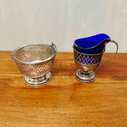 A Pair Of Sterling Silver Pierced  Salt Cellars And Jam With Glass Inserts