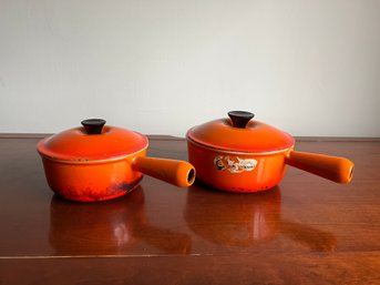 Pair Of Le Creuset Orange Flame Saucepans