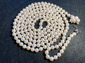 31 INCH KNOTTED AKOYA PEARL STRAND W/ 14K DIAMOND CLASP