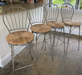 A Set Of Four Metal & Rush Seat Swivel Kitchen Counter Stool By Pier-1