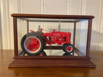 Toy Tractor Under Glass