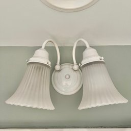 A Double Light Frosted Sconce
