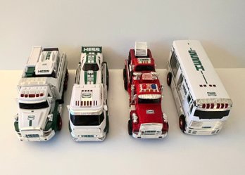 4 *Collectible* Hess Trucks
