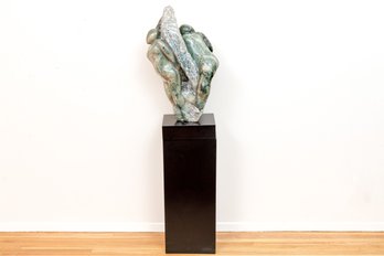 Hand-carved Stone Figural Sculpture On Black Pedestal