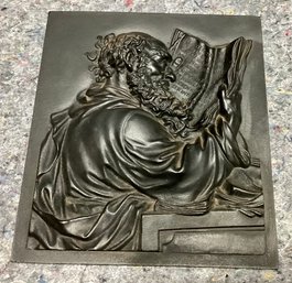 Cast Sculptural Patinated Plaque Of A Bearded Man With Large Book