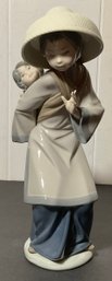 Lladro # 5123, Asian Woman Carrying Baby Figurine.