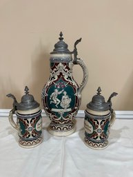 Three German Steins Each With Hinged Pewter Lids