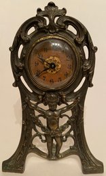 Vintage Antique Warner - Ornate Iron Shelf Mantle Desk Clock - Putti Figural - Brass Or Bronze Wash -  Windup