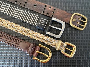 Lot Of Four Assorted Belts, Including A Grommeted, Studded And Two Woven Styles