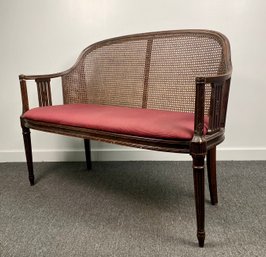 Antique Caned Seat Settee With Cushion