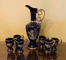 Cobalt And Gilt Rimmed Pitcher And Six Demitasse Cuos