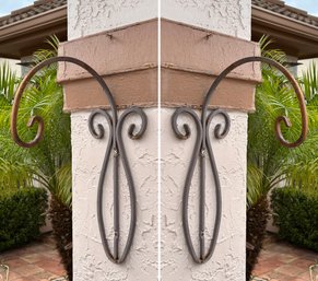 A Pair Of Wrought Iron Plant Hangers