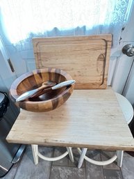 Wooden Cutting Board And Salad Bowl And Spoons