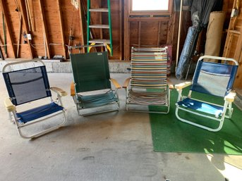Group Of Four Sand Beach Chairs