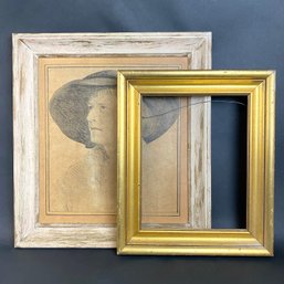 Framed Portrait And Empty Gold Frame