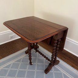 A Mahogany Spindle Drop Leaf Table