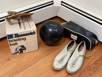 A Brunswick Bowling Ball & Shoes