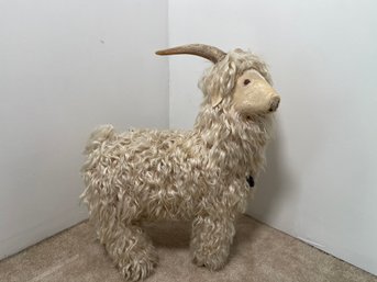 A Wooden Goat With Real Fur & Horns, Wearing Stone Necklace