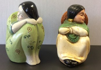 A Pair Of Ceramic Figurine