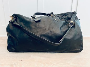 Black Leather T. Anthony Travel Bag
