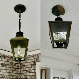 A Pair Of Copper Hanging Lanterns